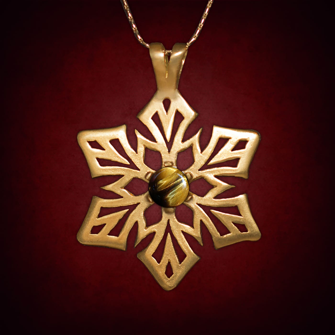 Astral Snowflake — Gold-Plated Silver · Tiger Eye